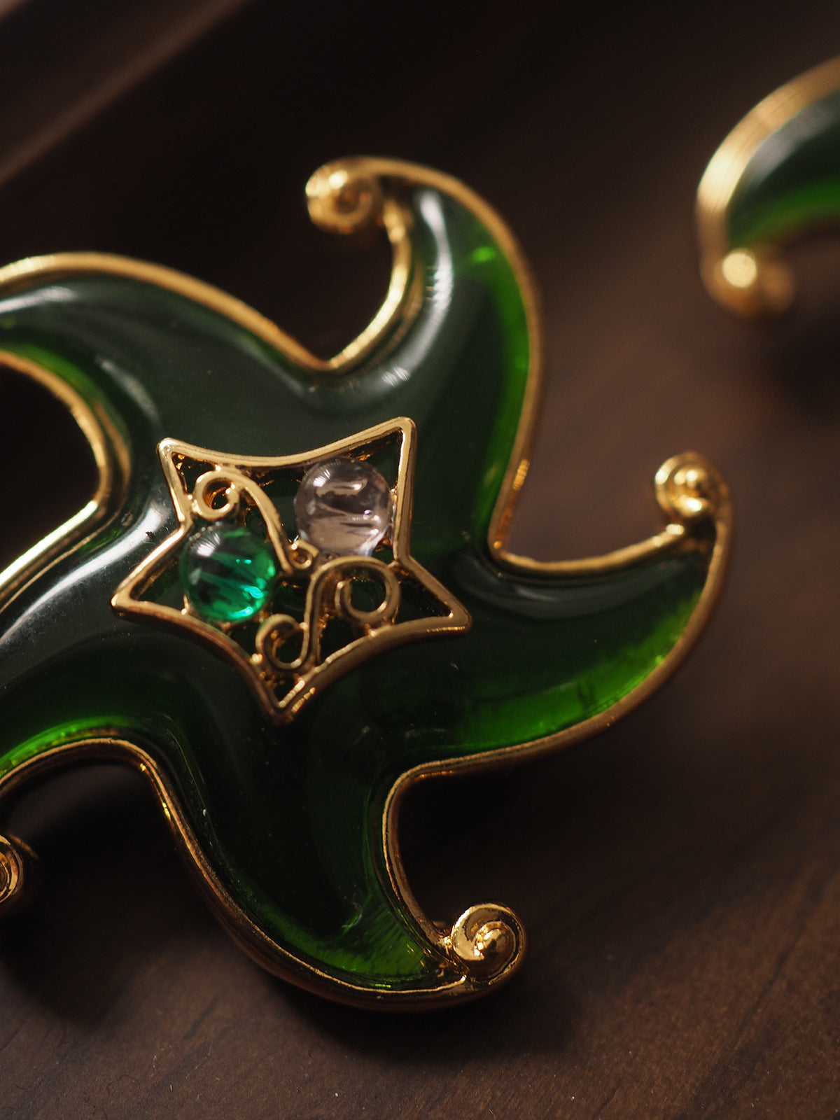 Starfish and Starfish Glass Emerald Ear Clips